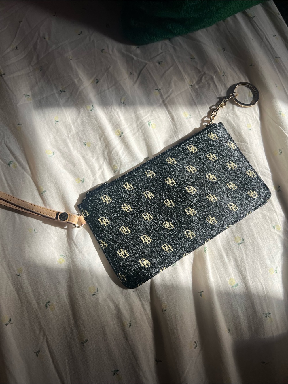Dooney & Bourke Black Monogram Wristlet with Tan Strap